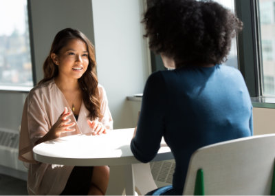 two women speaking